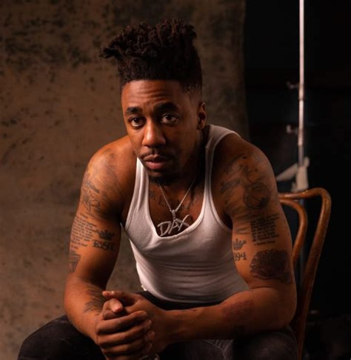 Canadian Rapper Dax Under Fire For Tattooing The Nigerian Flag On His Neck