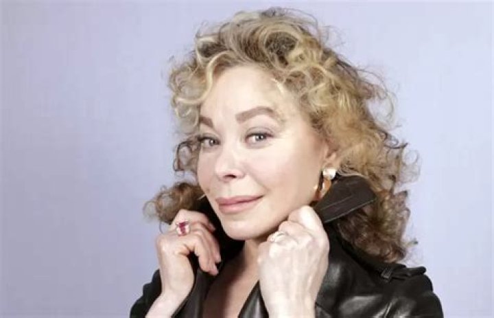 Grace De Capitani Père