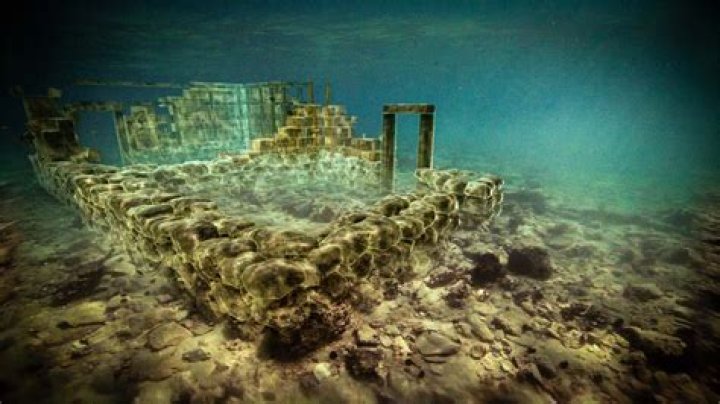 Sunken Structure Emerges From Water